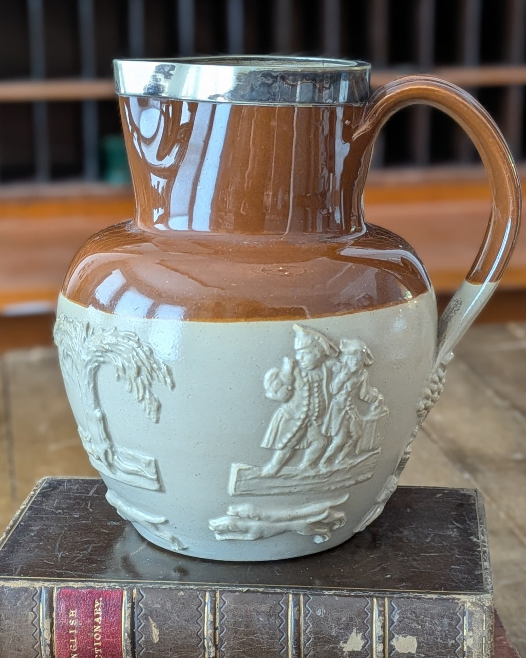 Large Stoneware Hunting Jug with Silver Rim