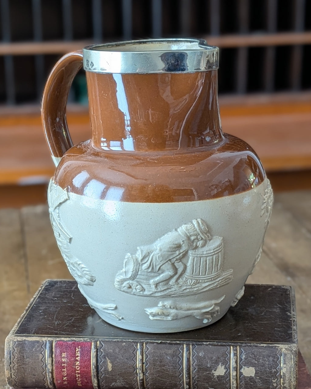 Large Stoneware Hunting Jug with Silver Rim
