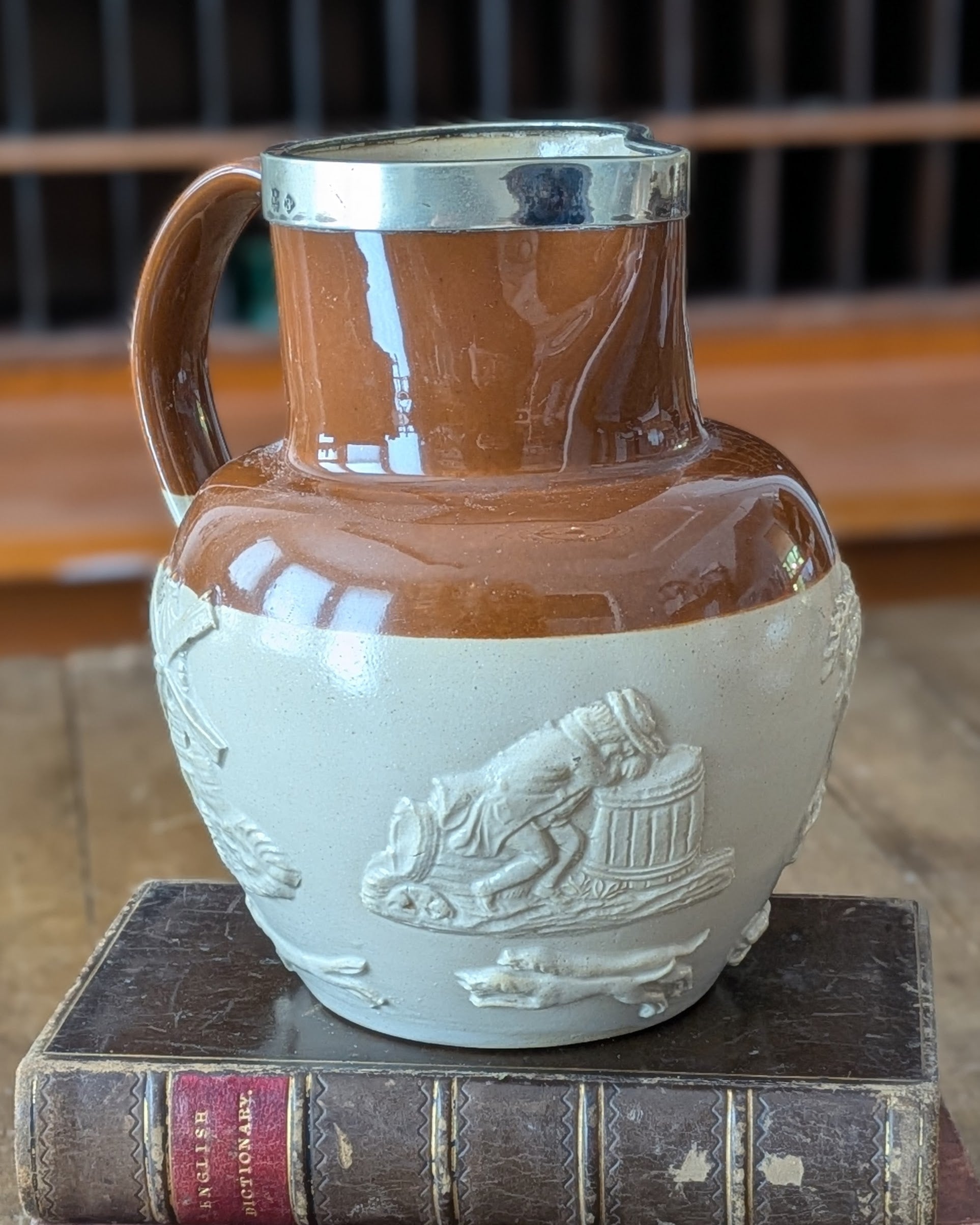 Large Stoneware Hunting Jug with Silver Rim