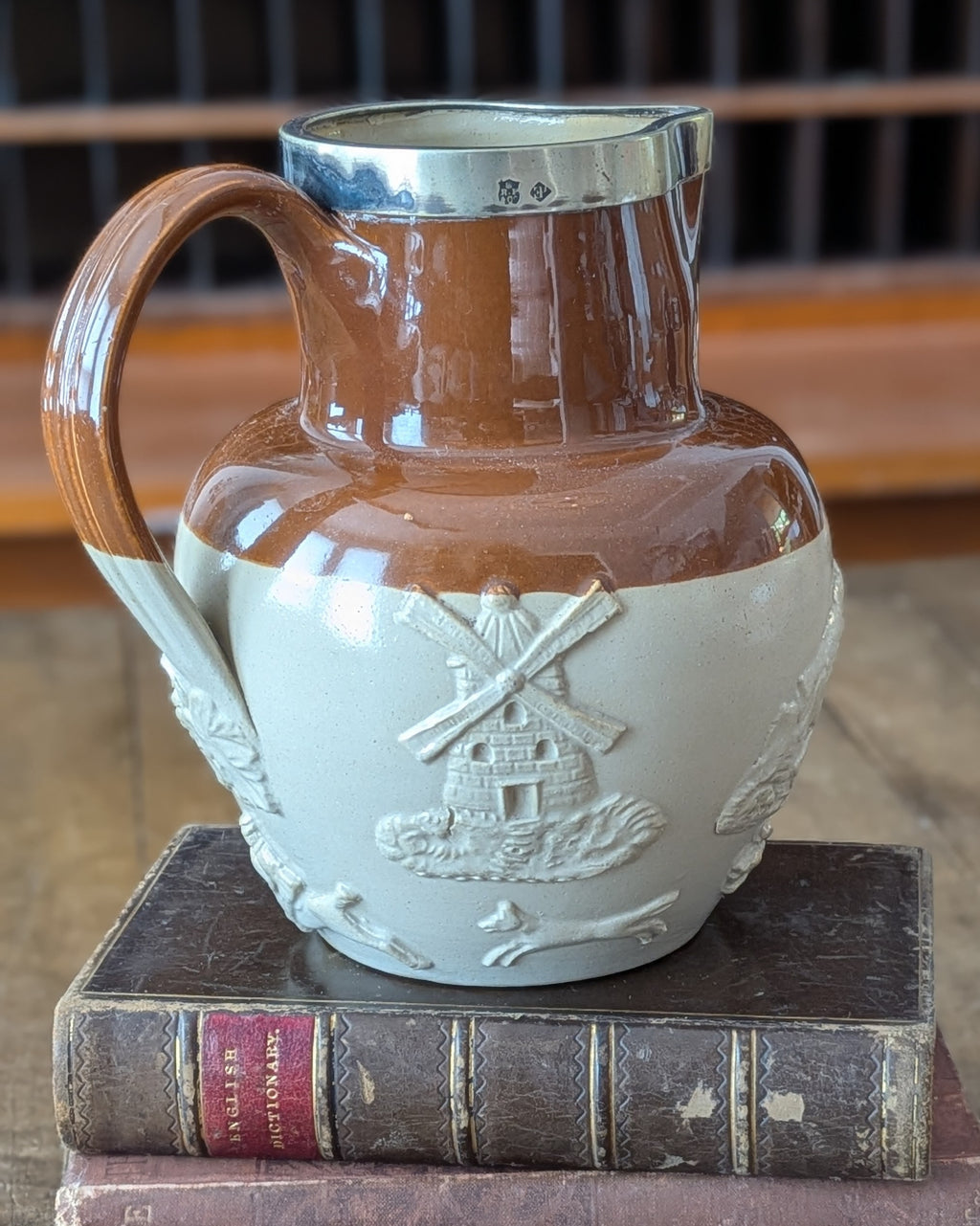 Large Stoneware Hunting Jug with Silver Rim