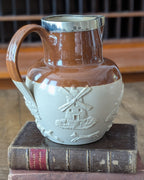 Large Stoneware Hunting Jug with Silver Rim