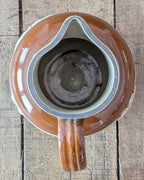 Large Stoneware Hunting Jug with Silver Rim
