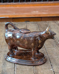 British Jackfield Brown Cow Creamer with Saddle Lid, c1850-1890
